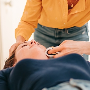 Patient having face cleaned after cosmetic acupuncture at Seneca Falls Acupuncture