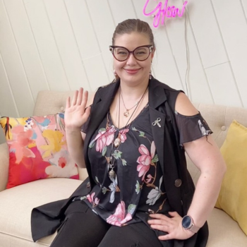 Portrait of Melody Osgood, licensed acupuncturist, certified in hospice and palliative care, and trained doula, in the office at Seneca Falls Acupuncture, located in the Finger Lakes Region near Geneva and Auburn, NY.